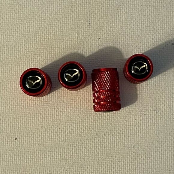 Mazda valve Stem caps in Red set of 4 NWT - Picture 1 of 4